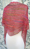 Shallow Tri Shawl worn in traditional triangle shawl style with front tails left hanging
