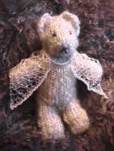 hand knitted teddy bear and shawl in handspun Teeswater wool