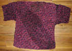 3-to-2 Any Gauge sweater knitted by Briony Gniechwitz, shown lying flat